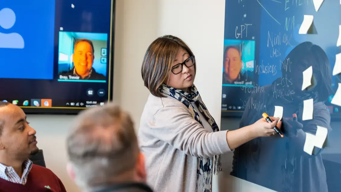 Employees from around the globe at a videoconference
