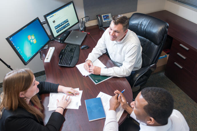 Keller employees in a meeting